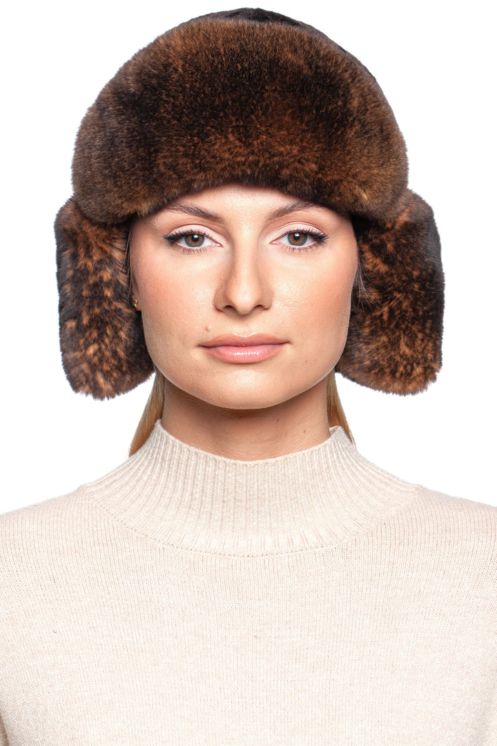 Brown lamb and Rex rabbit fur trapper hat on a model, perfect for winter warmth and style.