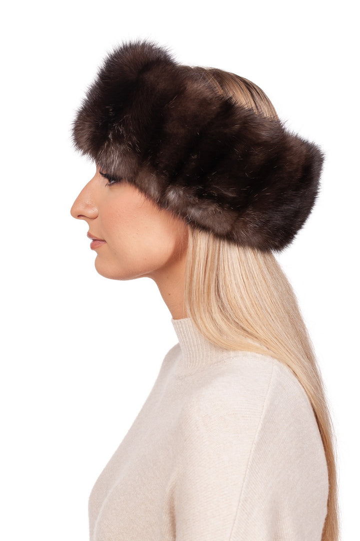 A woman with long blonde hair is pictured in profile against a white background, dressed in a light-colored sweater, wearing the luxurious Russian Sable Fur Headband from FurbySD, expertly handcrafted in Lithuania.