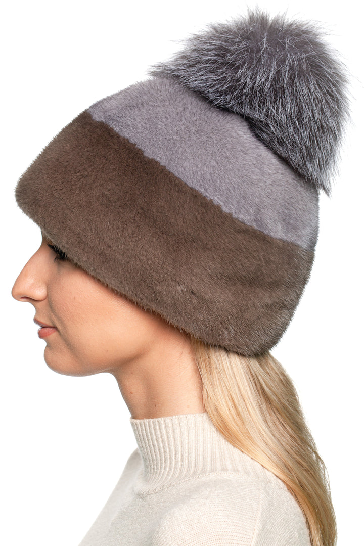 Luxury mink fur hat with silver fox pom pom, elegant brown and grey fur beanie for stylish winter outfits.