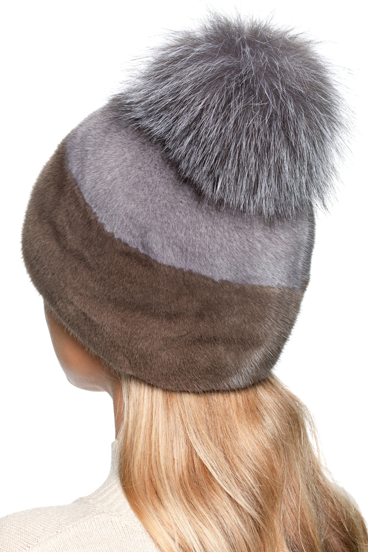 Back view of two-tone mink fur hat with large fox fur pom pom, handmade real fur winter beanie for women.