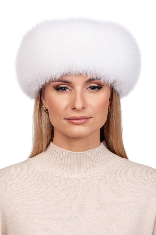 A person models the FurbySD White Fox Fur Mittens and Headband Set, perfectly complementing their beige sweater as straight blonde hair cascades over their shoulders, all set against a plain white background.