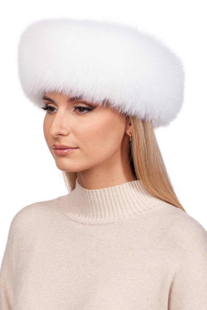 A woman with long blonde hair is seen wearing a cream-colored turtleneck sweater and the White Fox Fur Mittens from the FurbySD White Fox Fur Mittens And Headband Set, as she gazes to the side against a plain white background.