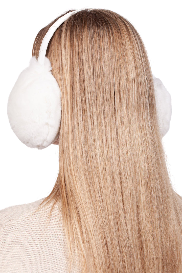 A person with long blonde hair is wearing the luxurious FurbySD White Rex Rabbit Fur Earmuffs, viewed from the back against a plain white background.