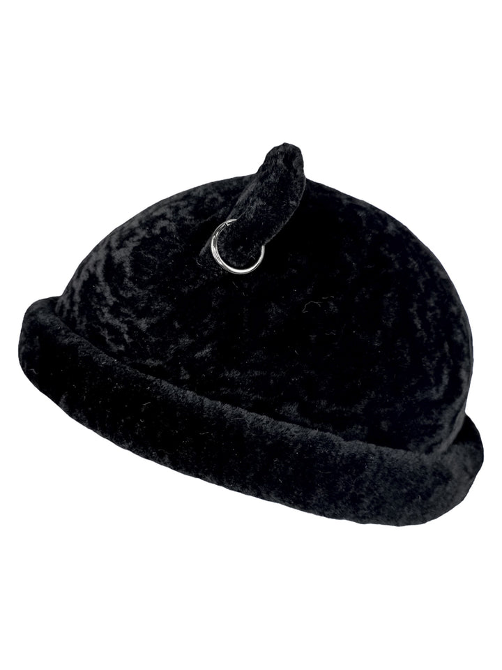 Side view of black lamb fur beanie with rolled brim and bear ears, real fur winter hat.