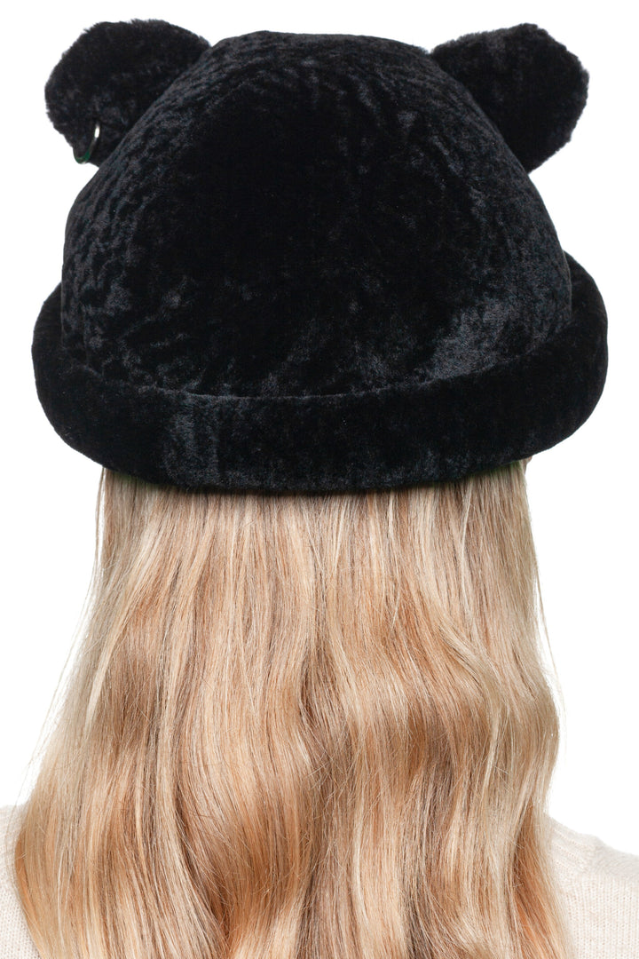 Rear close-up of lamb fur beanie with playful bear ears, unisex real fur winter hat