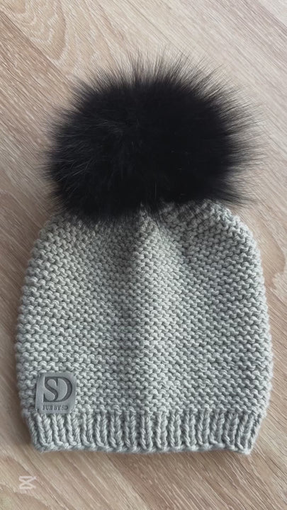 Luxurious FurbySD handknitted grey merino wool beanie with large black fox fur pom pom.