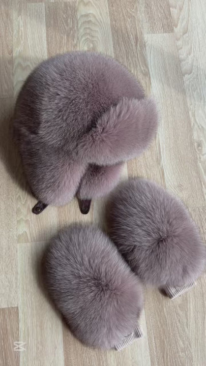 Luxurious dusty pink fox fur earflap winter hat with matching convertible mittens.

