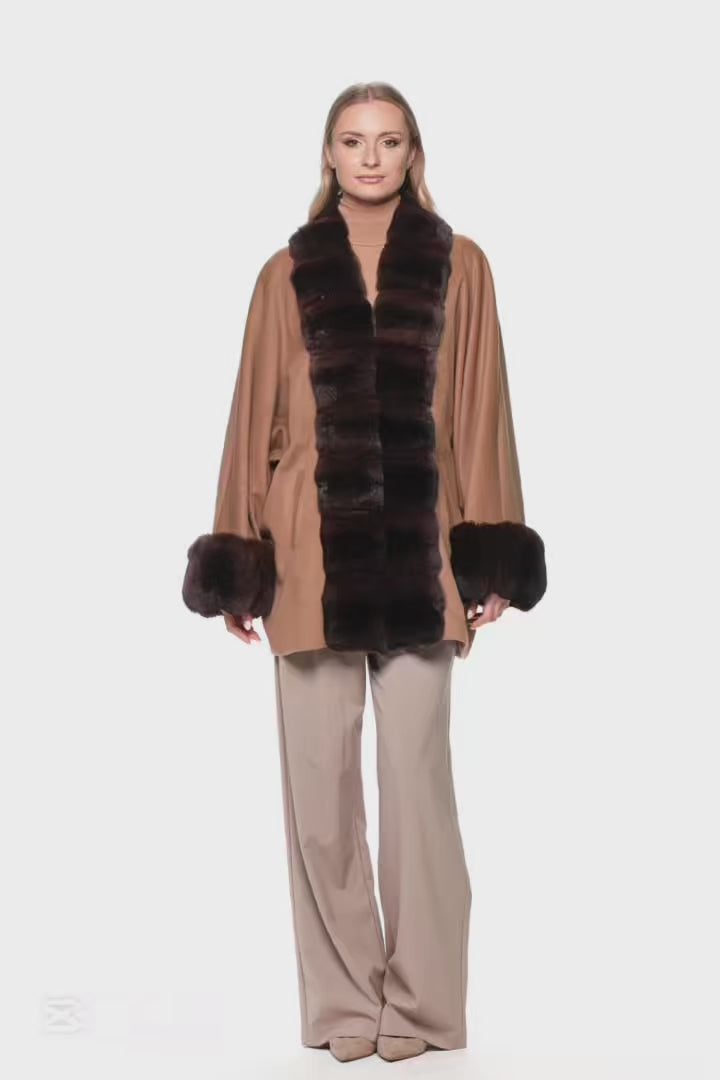 A woman wearing Brown Chinchilla Fur Trimmed Cashmere Coat on a white background.