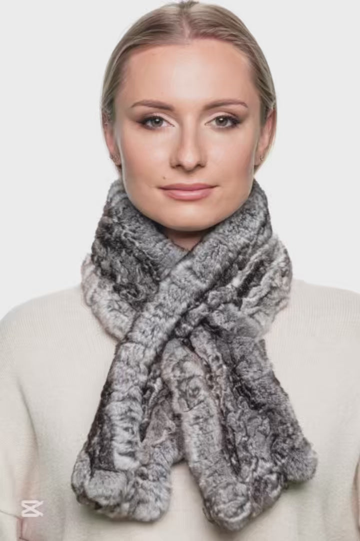 Fluffy grey Rex rabbit fur scarf shown on woman, hand-knitted real fur wrap for elegant cold-weather fashion.