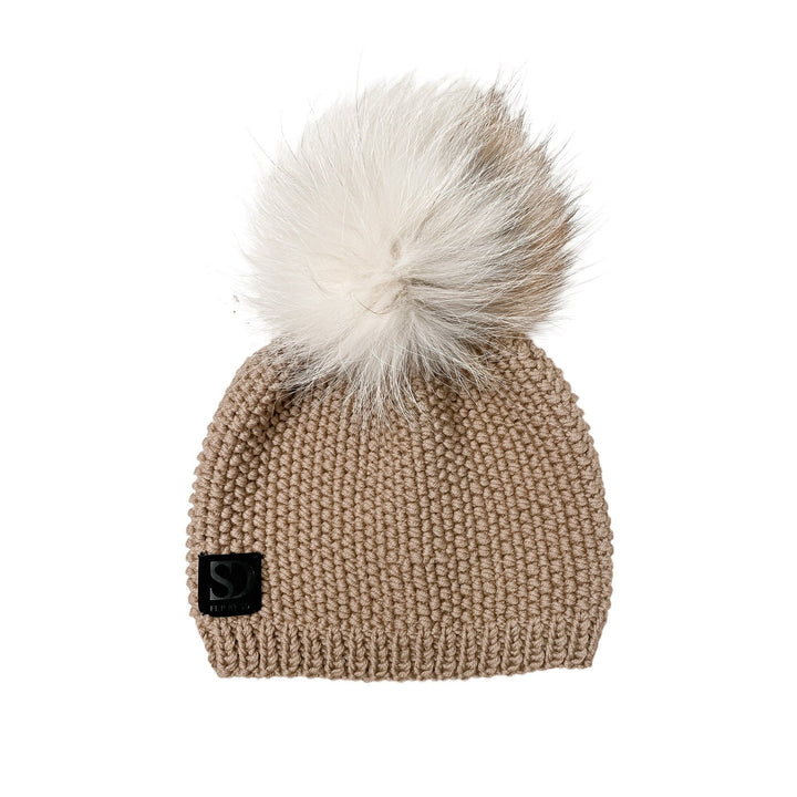 warm winter beanie cap with fur tassel